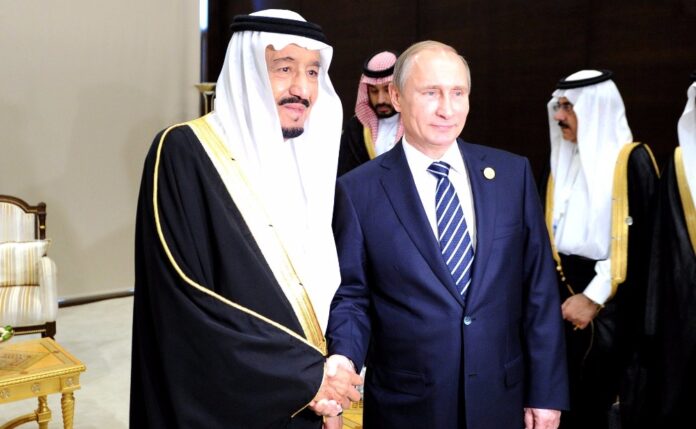 رئيس روسيا فلاديمير بوتين وسلمان ملك المملكة العربية السعودية